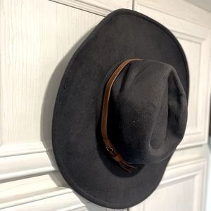 Navy and brown leather wide brimmed hat with adjustable ribbon